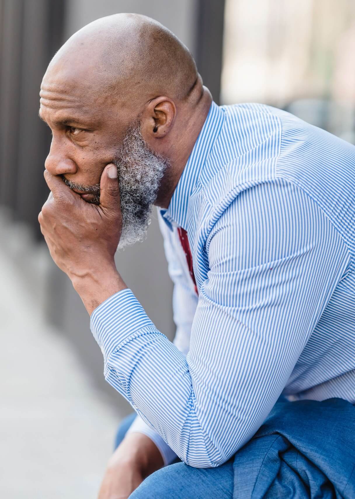 business man sitting outside